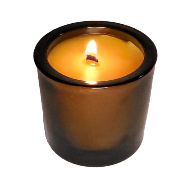 glass container candle burning