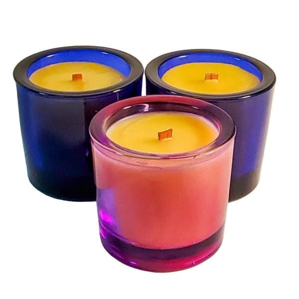 Group of three small round glass container beeswax candles