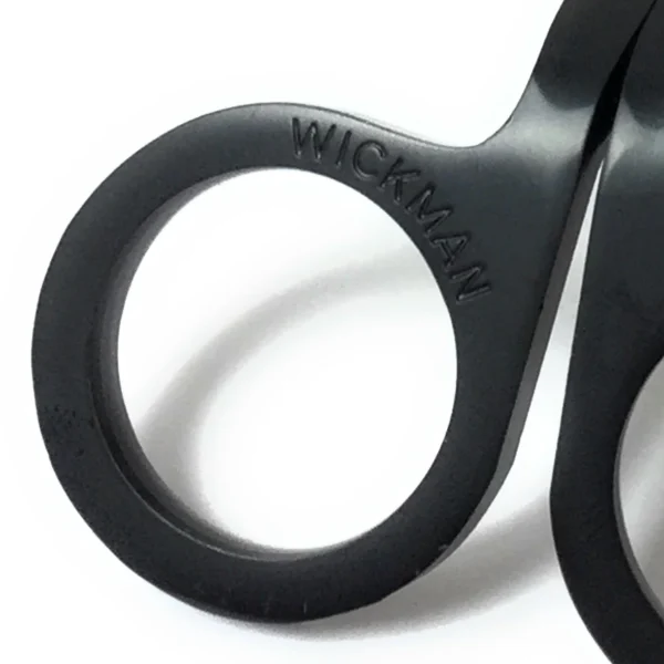Wickman logo detail close up on handle of wick trimmer
