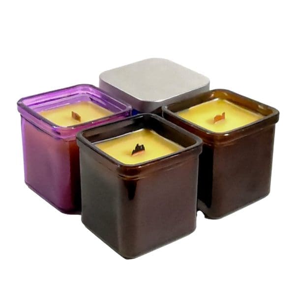 group of four glass square container beeswax candles